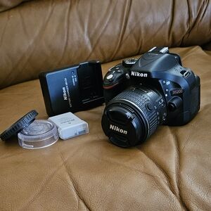 Nikon D5200 Digital SLR 24.1 MP Camera With 18-55mm VR Lens Plus Accessories.